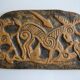 Bas-relief sculpture in terracotta inspired by the Celtic bestiary