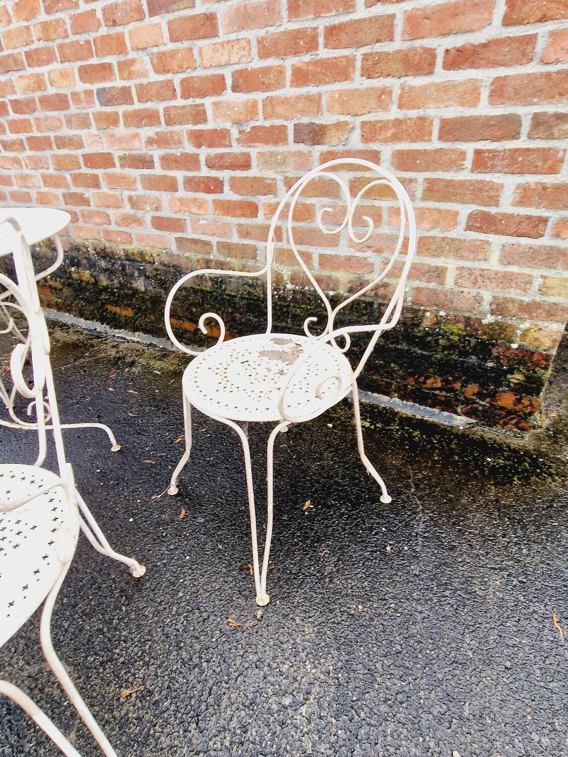 Wrought iron garden furniture chairs and table