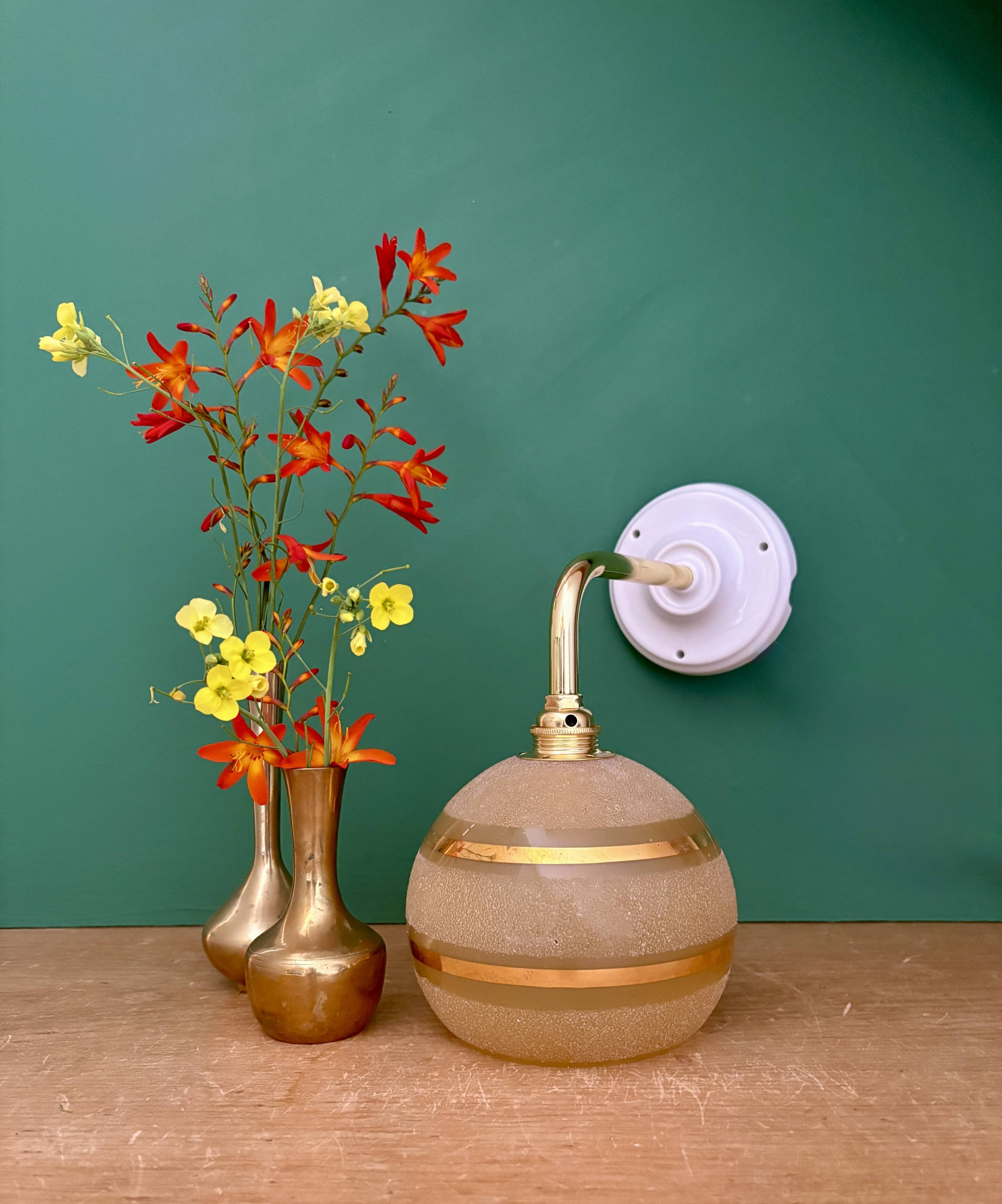 Vintage globe angled wall light in yellow and gold granite glass