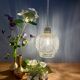 Suspension globe vintage en verre moulé transparent