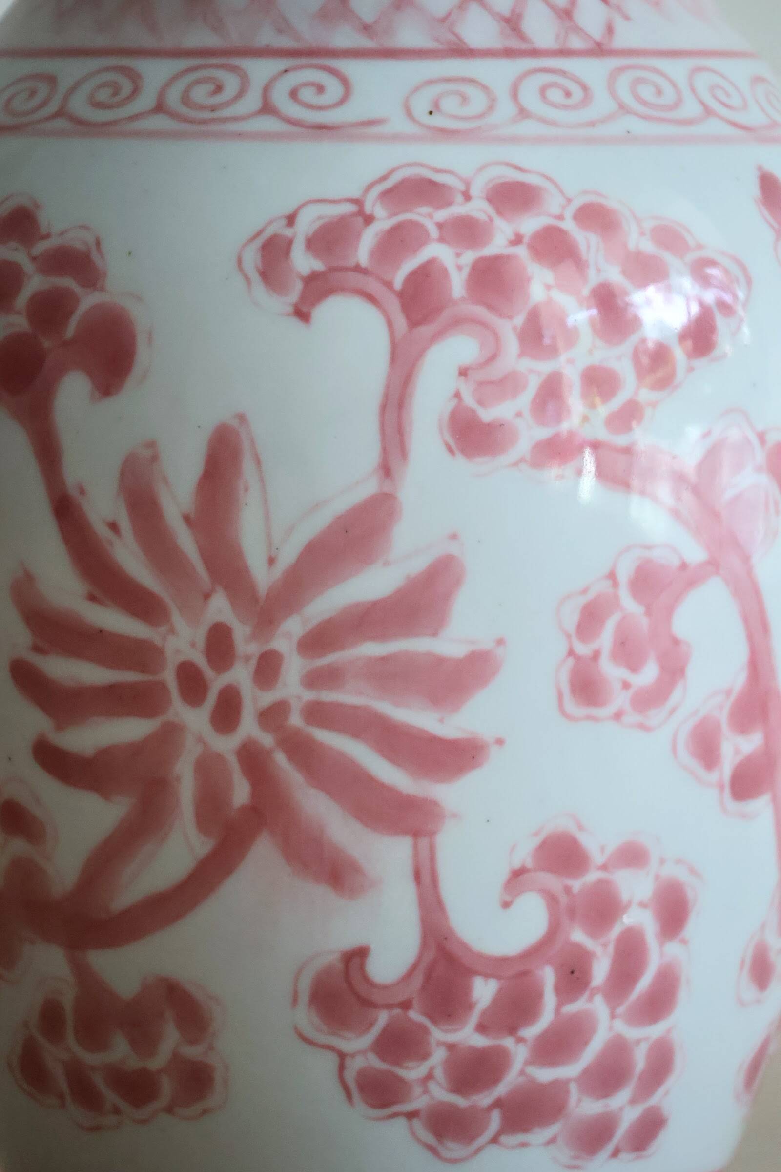 Chinese style flower vase with red and white flowers