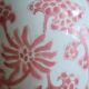 Chinese style flower vase with red and white flowers