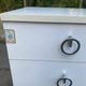 White, glossy lacquered wooden chest of drawers from the 1980s