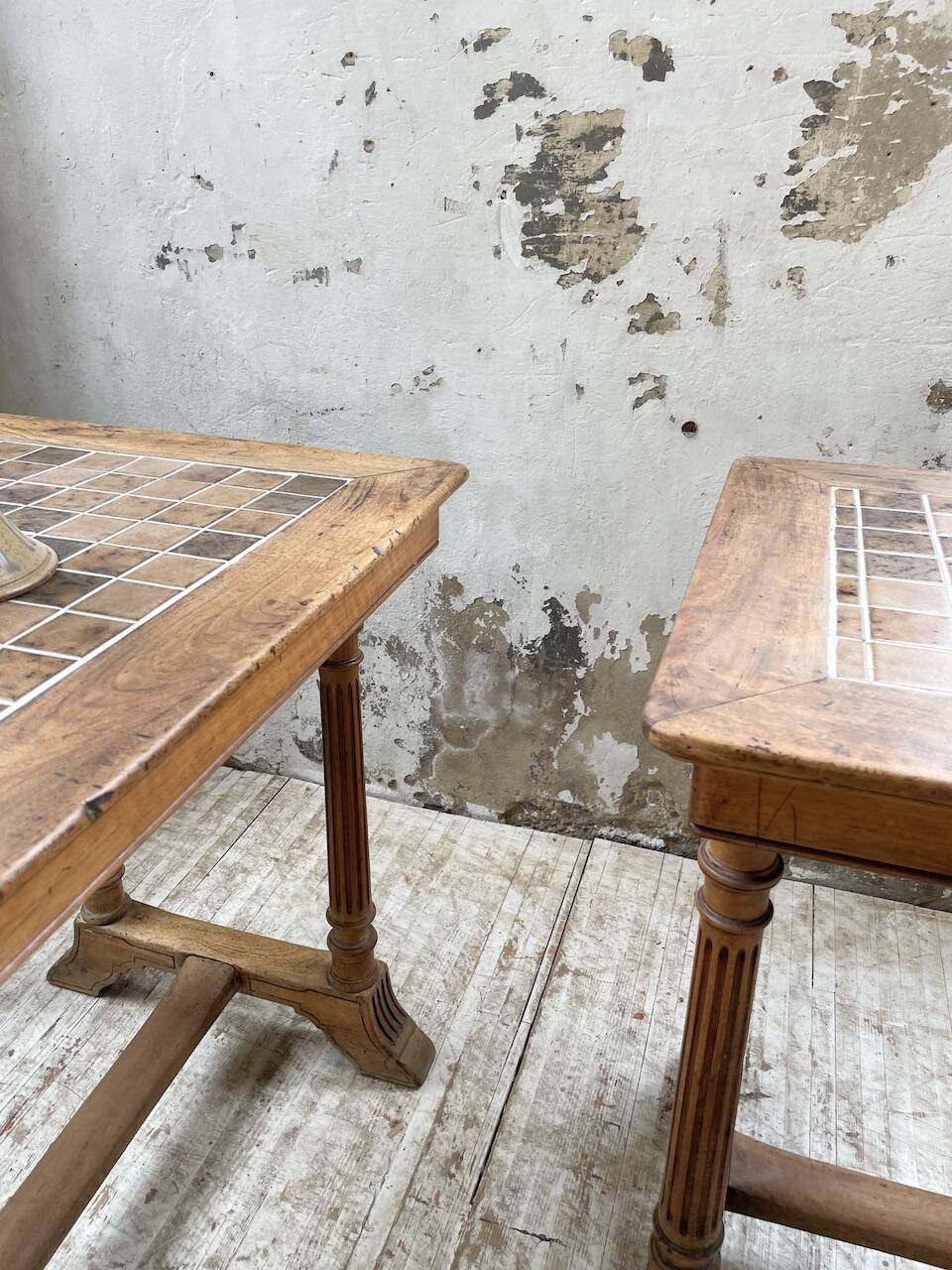 Set of two bistro tables in walnut and tiling from 1890.