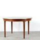 Midcentury extending round teak table and chairs by Nathan