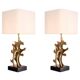 Pair of table lamps in patinated brass and black granite base.