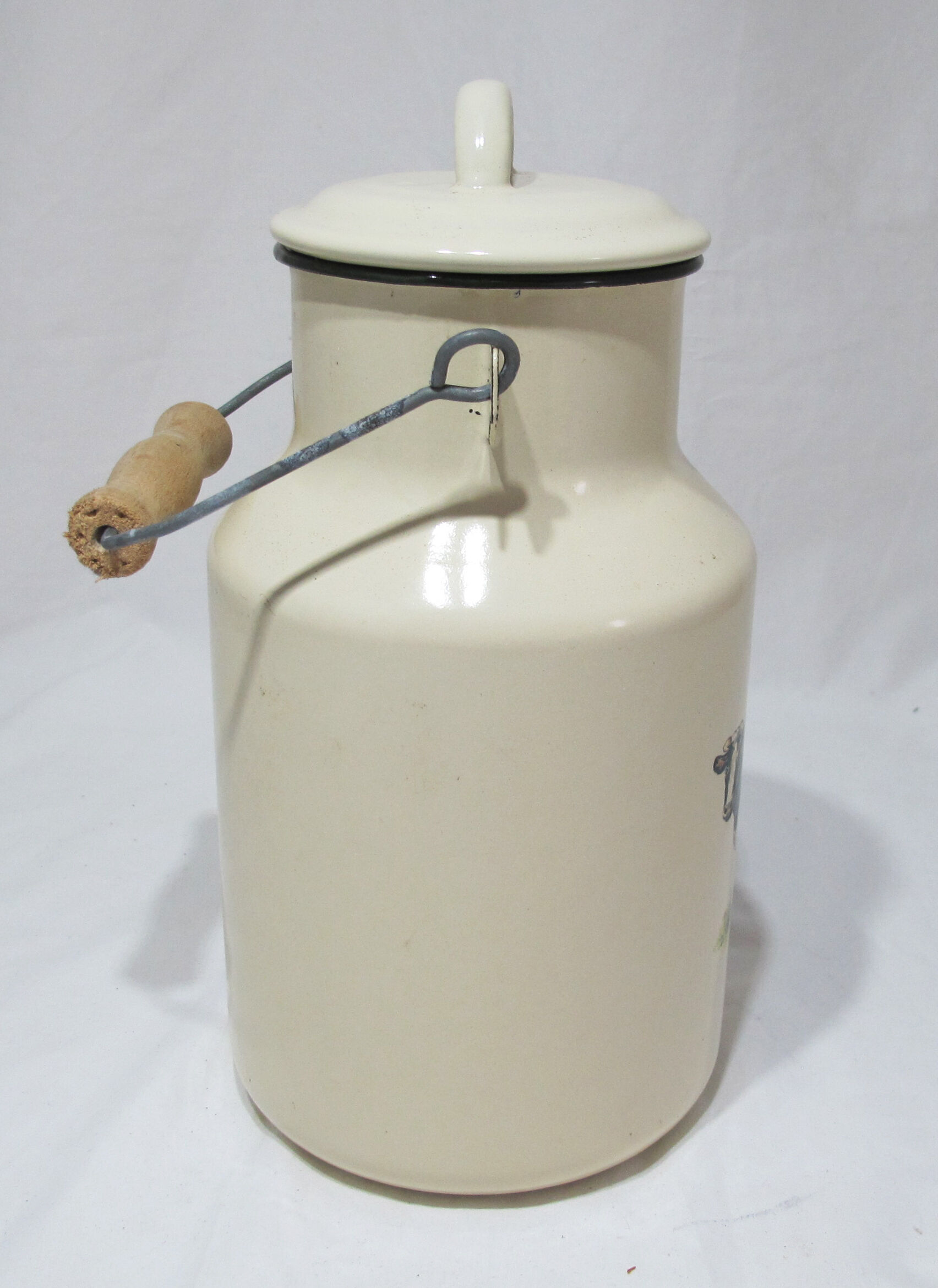 Milk jug in vintage enamelled sheet metal