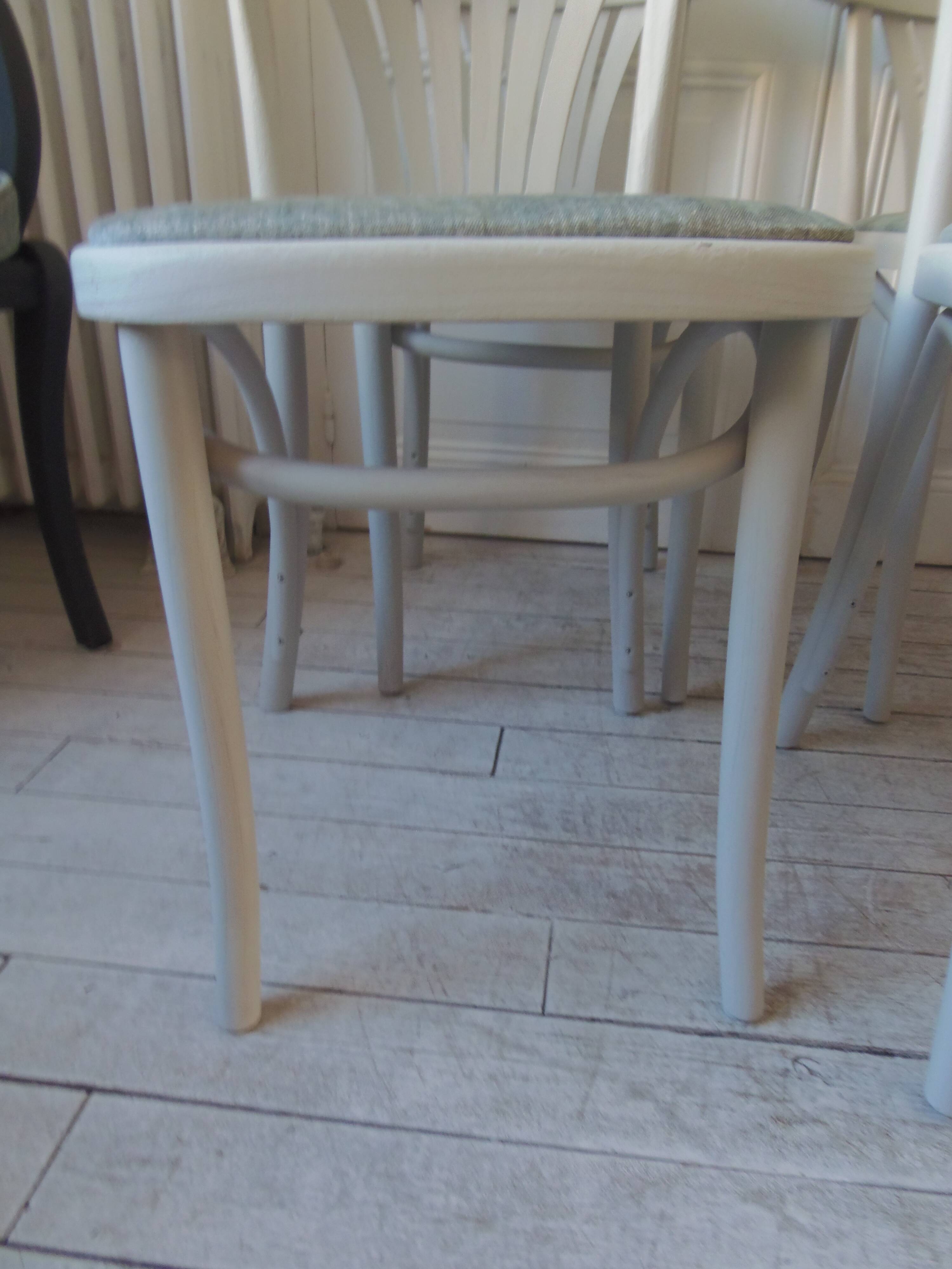 Set of 4 vintage bistro chairs enhanced in pearl grey.