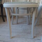 Set of 4 vintage bistro chairs enhanced in pearl grey.