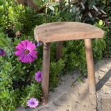 Old wooden tripod stool