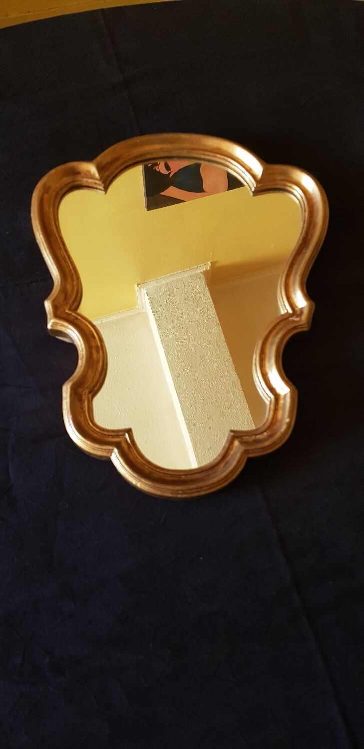 Louis XV style mirror in gilded wood.