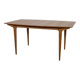 Mid-century teak extending dining table from McIntosh, UK.
