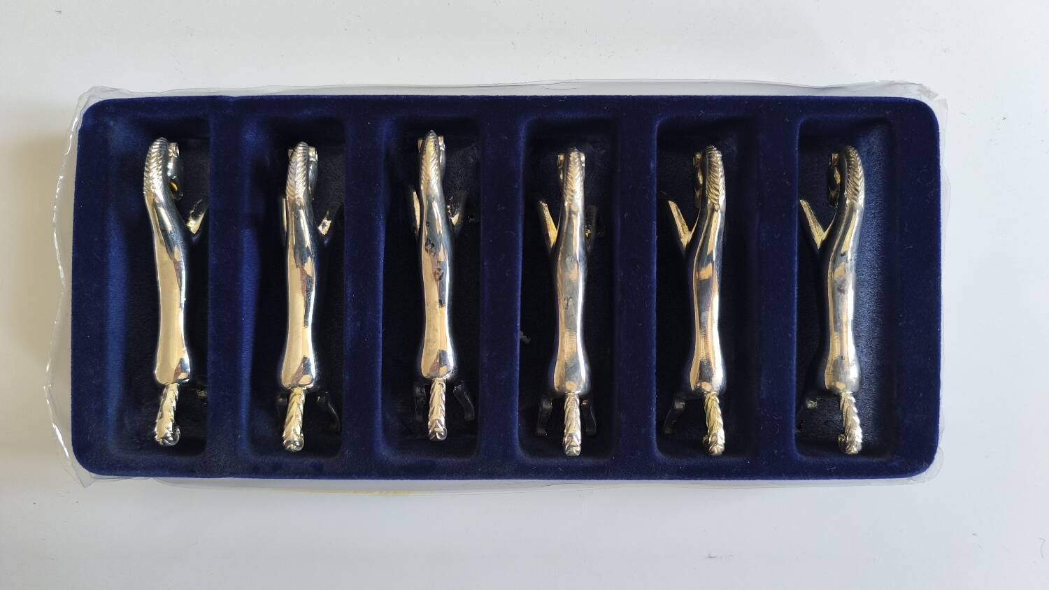 Set of 6 silver metal knife rests