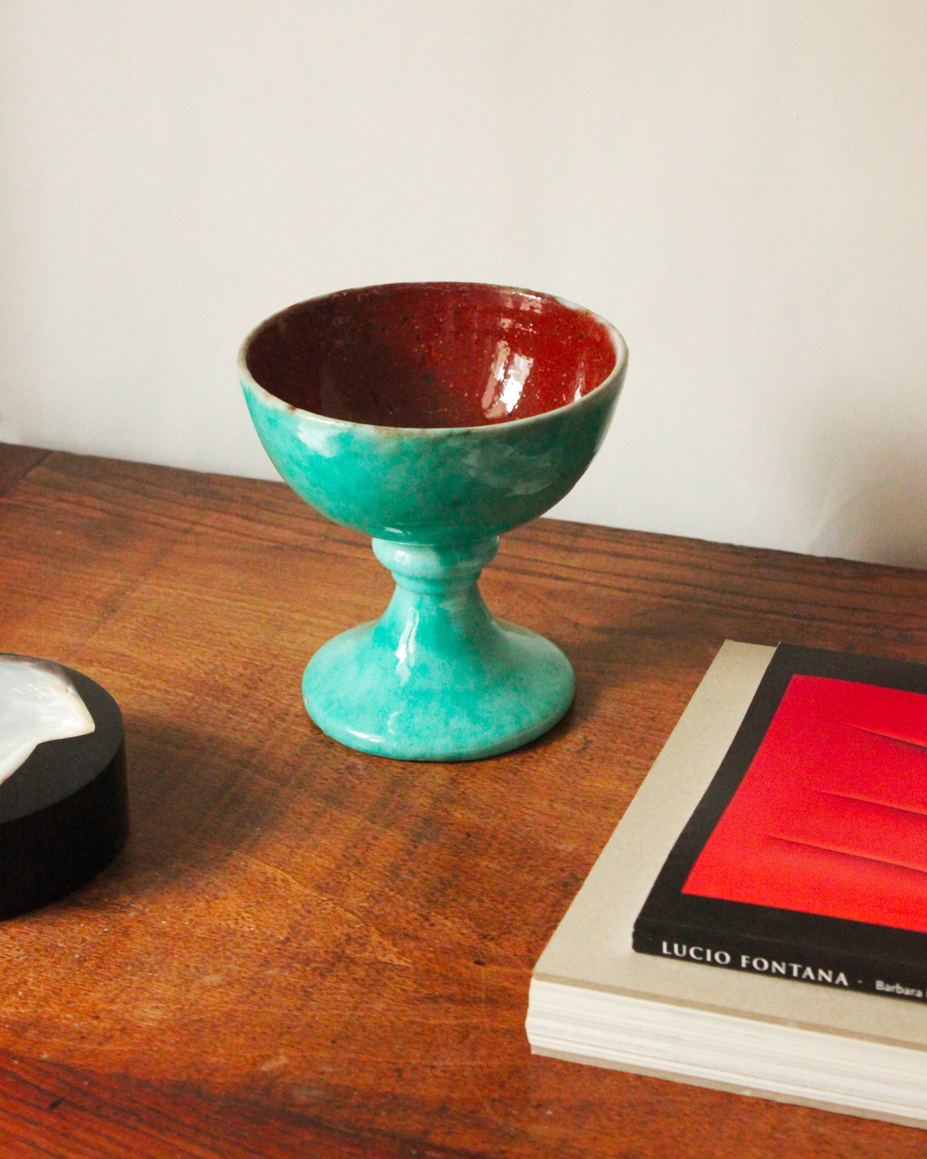 Cup on a pedestal or chalice in cloudy lagoon green glazed terracotta