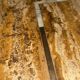 Coffee table in travertine with mother-of-pearl inlays.