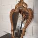 Rococo Style Mirror in Gilded Wood with Sculpted Pediment