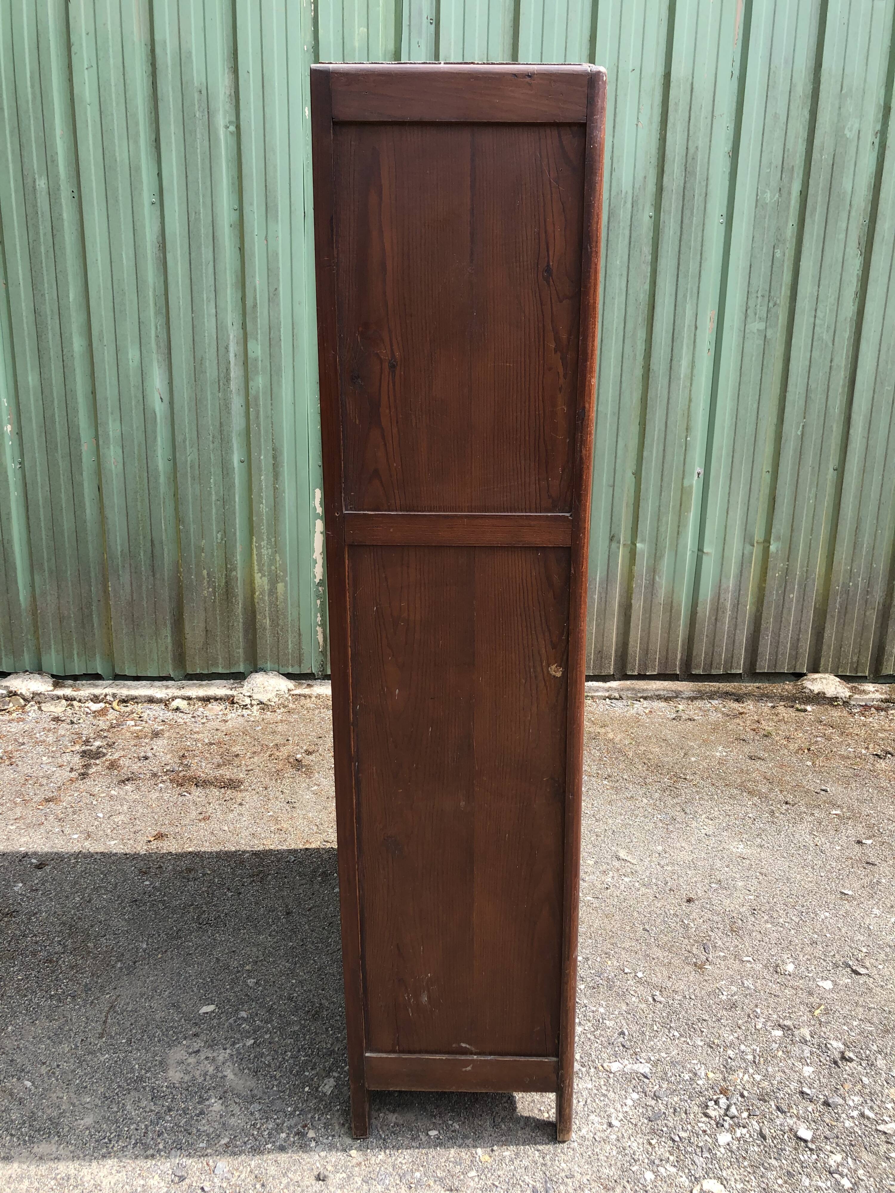 Vintage Parisian pine cabinet.