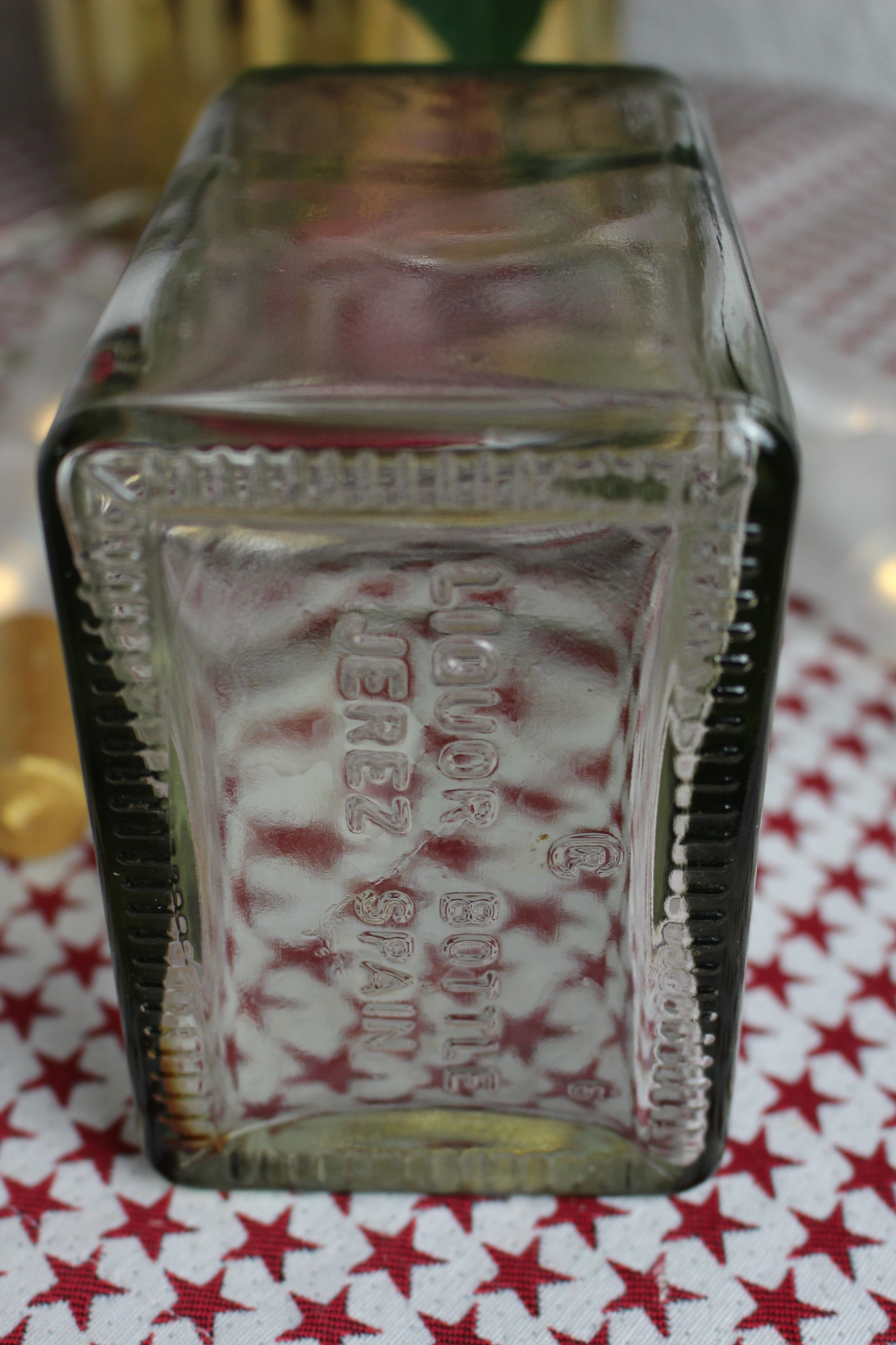 Decorated rectangular glass carafe