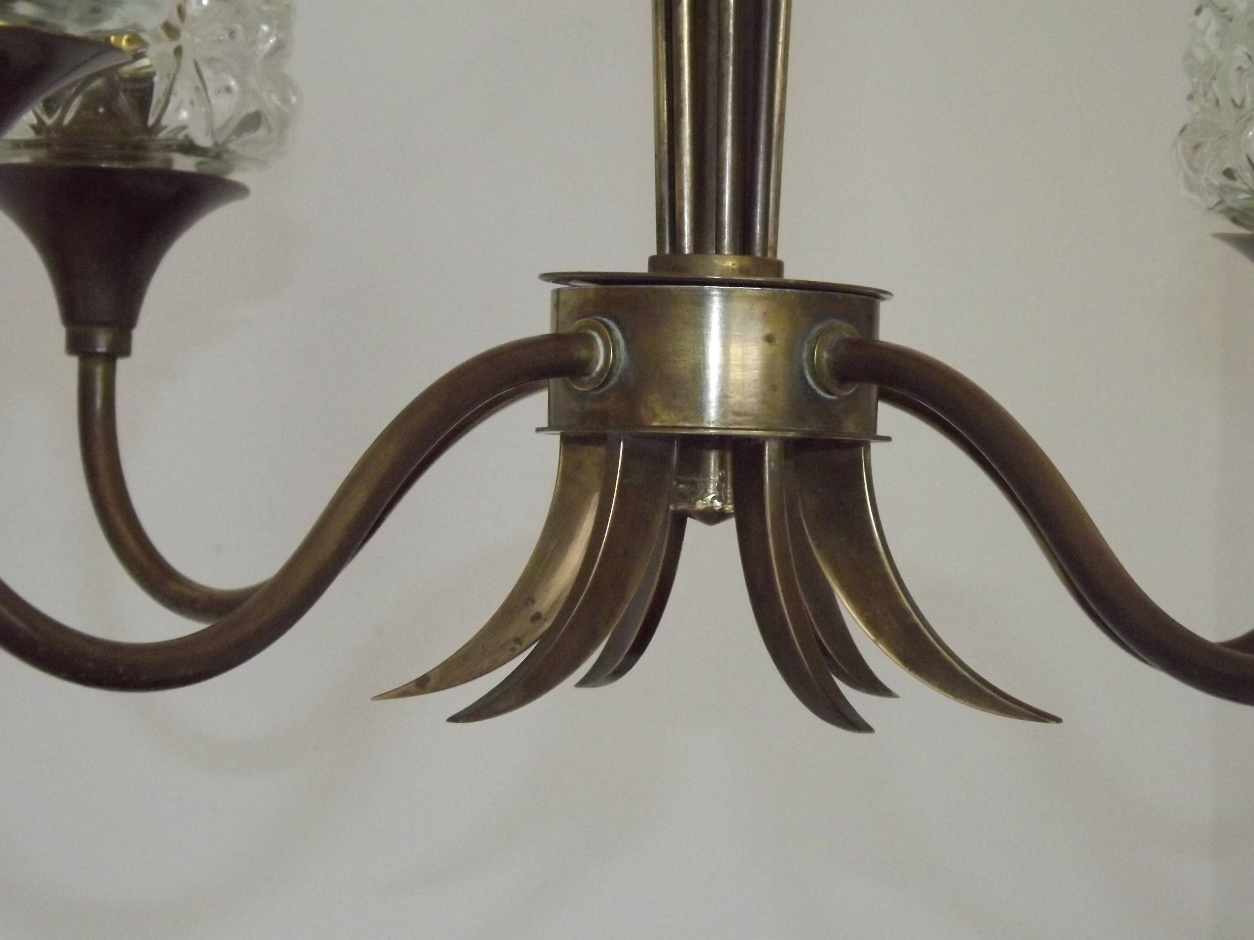 French vintage retro chandelier with 4 lights in brass and bronze with cut glass shades.