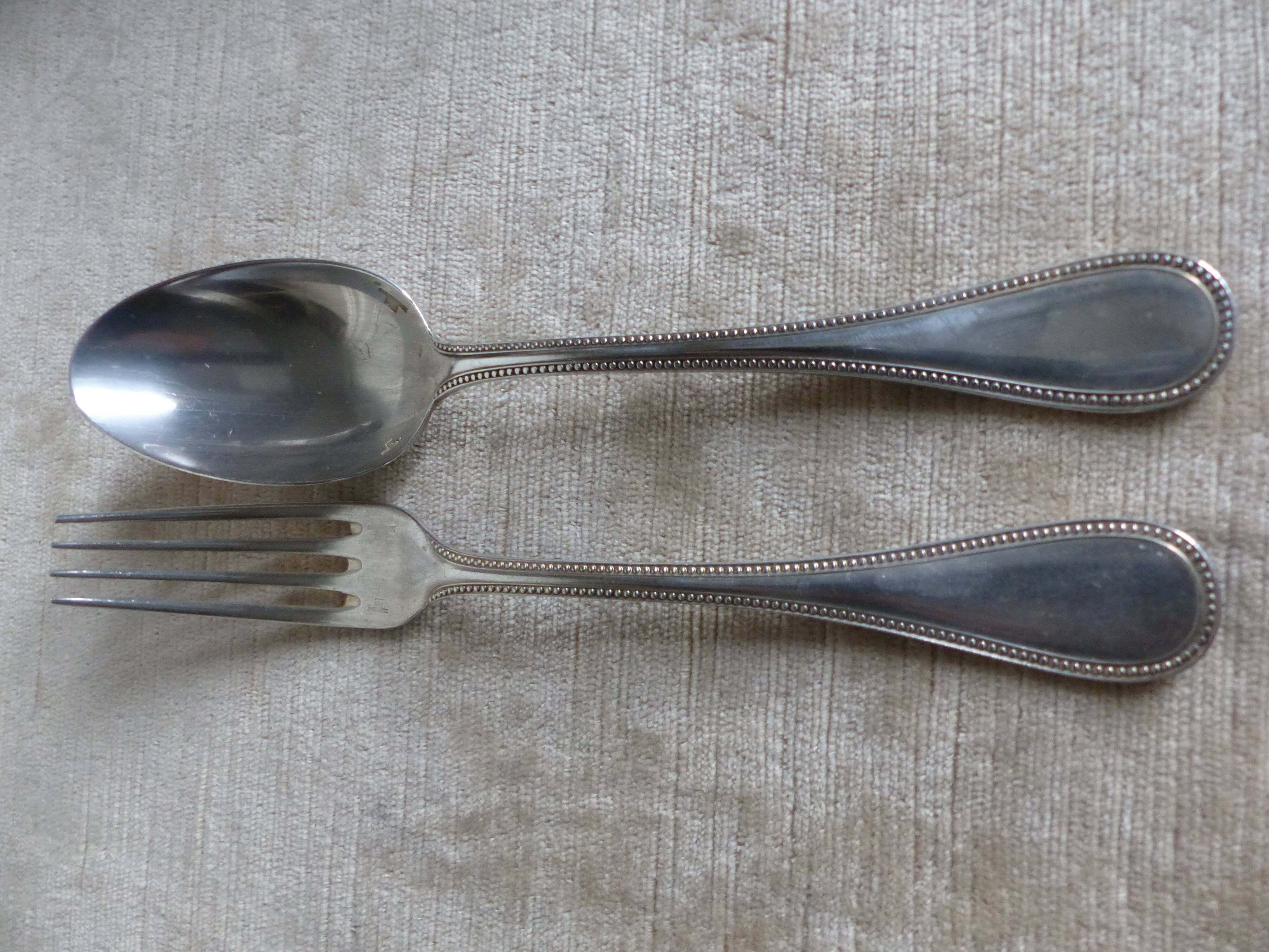 Six spoons, six forks, a ladle Christofle beaded style