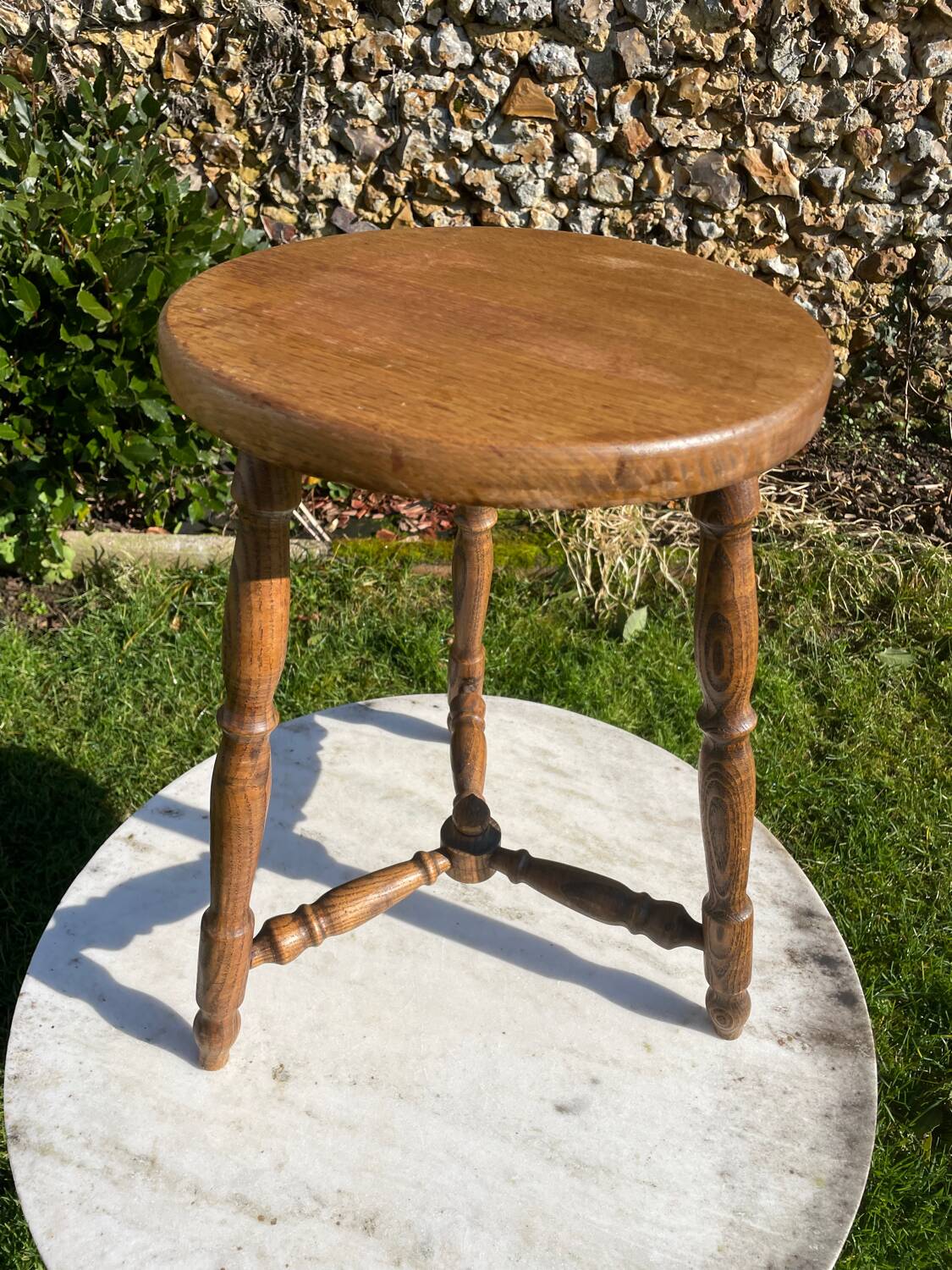 Antique oak tripod stool