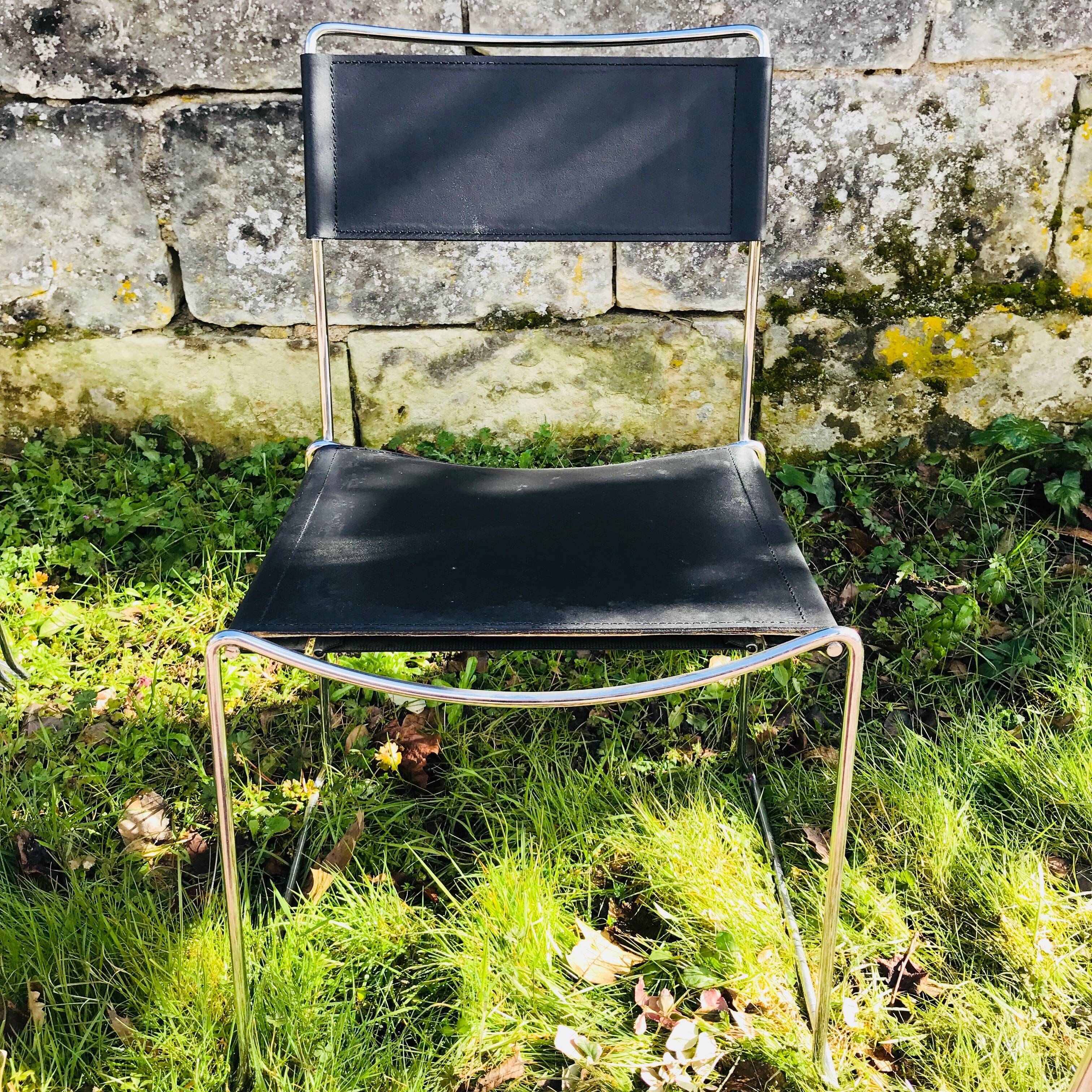 Lot of 6 design black leather and chrome chairs