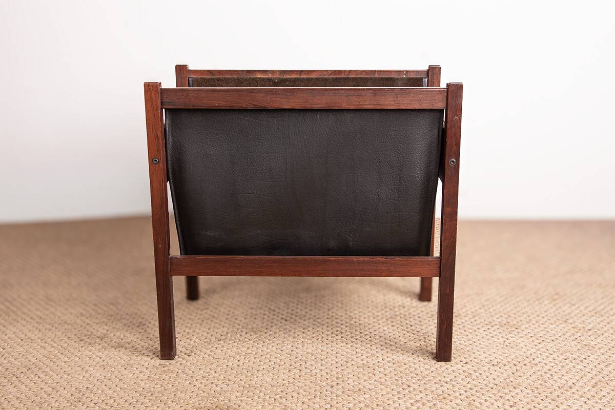 Danish magazine rack in rosewood and leather, 1960.