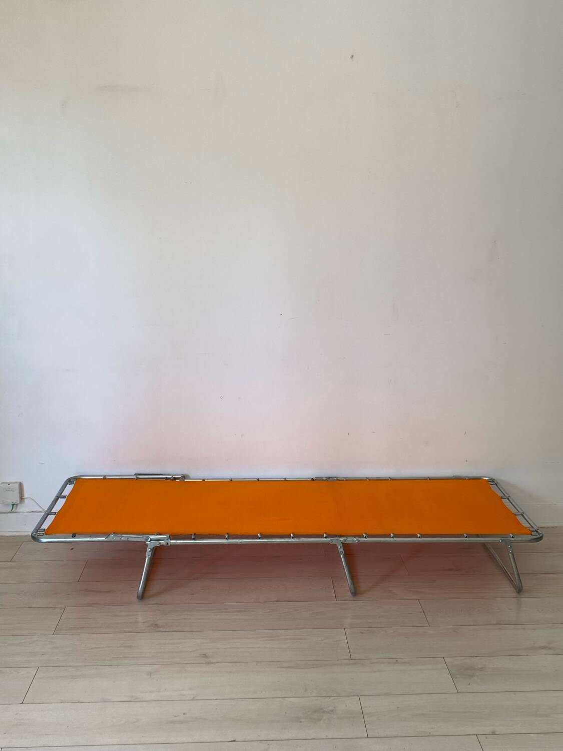 Orange and metal deckchair 1970
