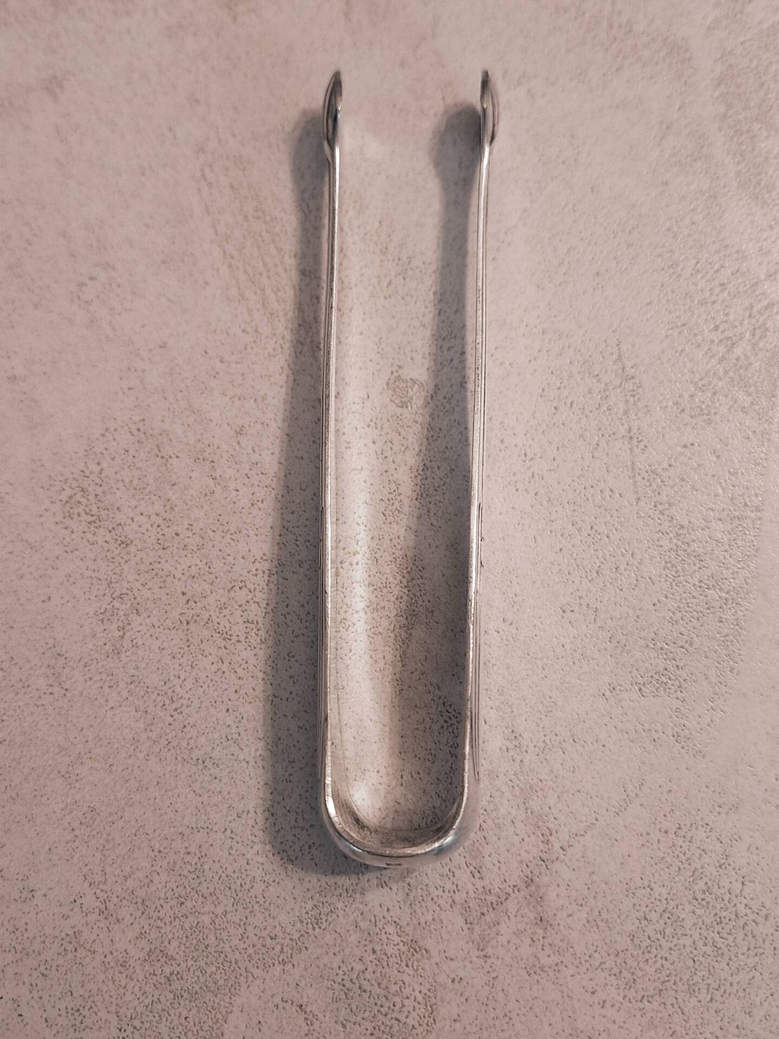 Pince à sucre en métal argenté