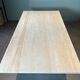 Dining table in travertine and brass. French work. Around 1970.