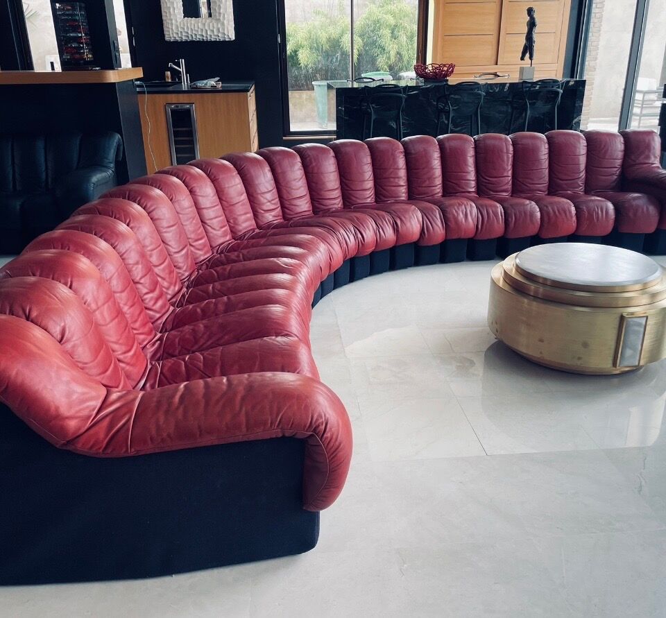 DS 600 model sofa or snake in dark red leather.
