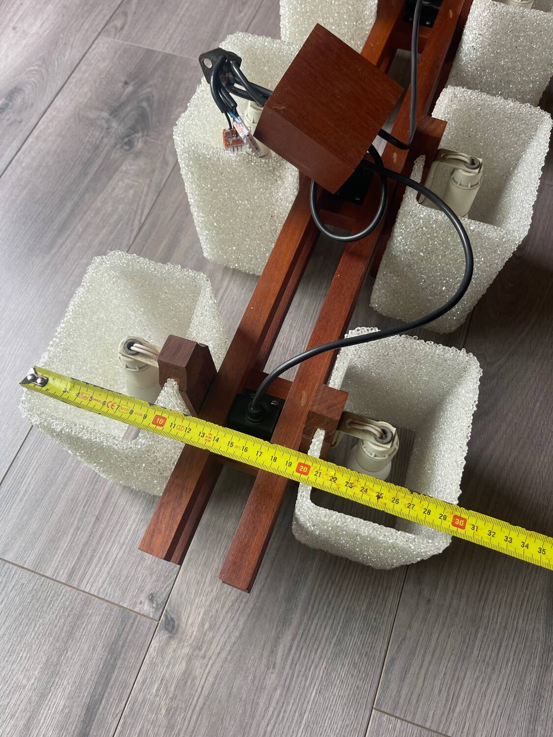 Scandinavian chandelier with 6 lights in teak and a perspex shade.