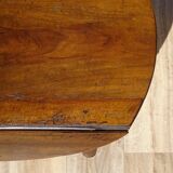 Antique walnut table with drop-leaf doors