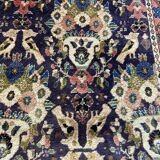 Antique Oriental rug from a nomadic tribe, 1950-1980, birds on a purple background