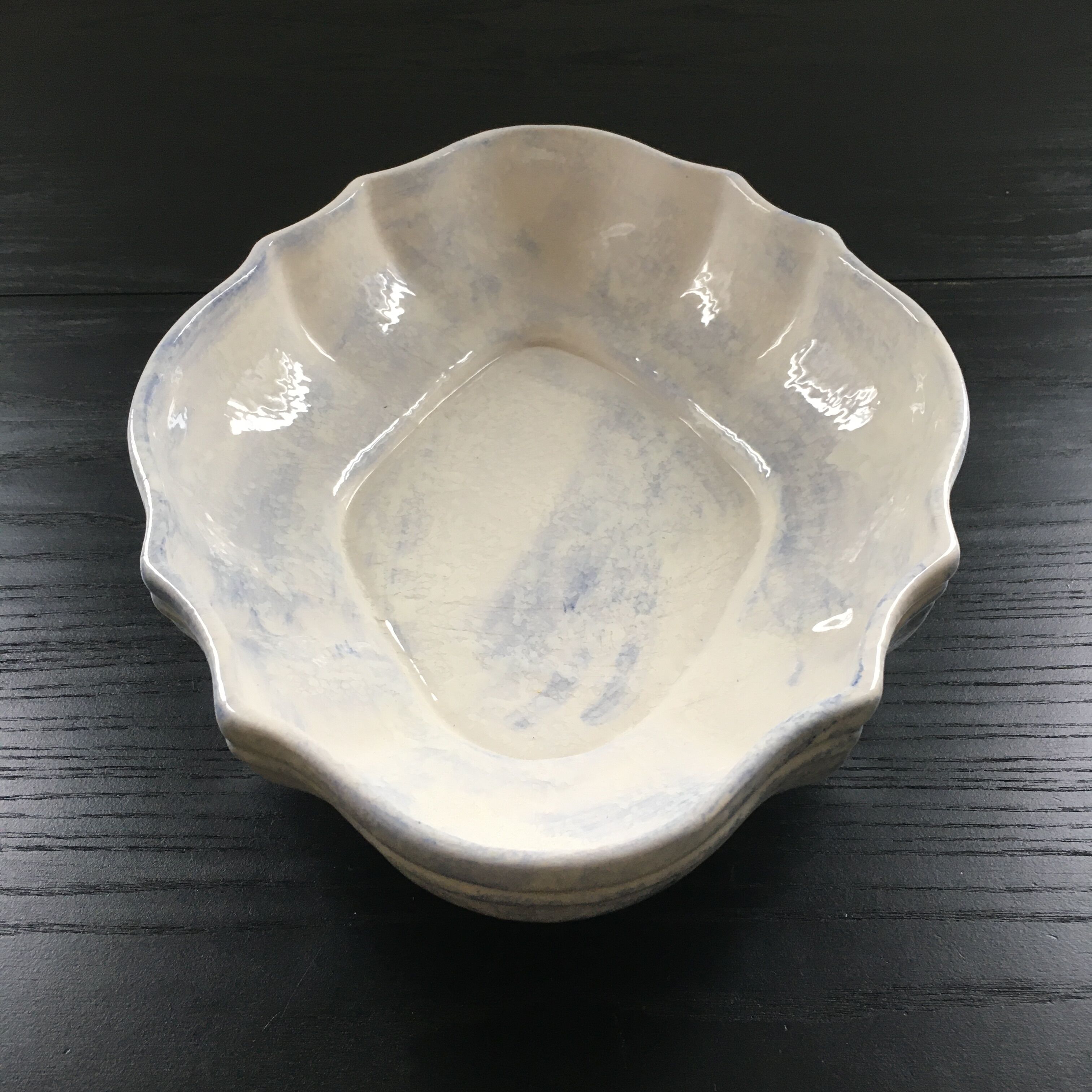 Scalloped hollow dish