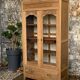 Parisian art deco glass cabinet in raw wood