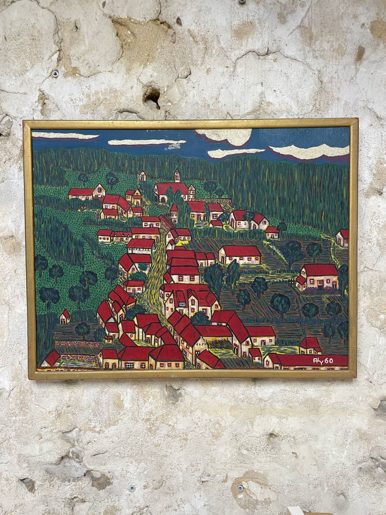 Peinture le village aux toits rouge