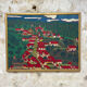 Painting the village with red roofs.