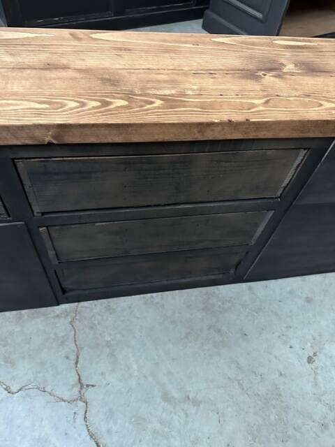 Old piece of furniture transformed into a TV stand
