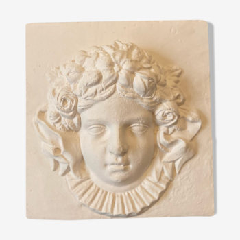 Reproduction of angel head in plaster