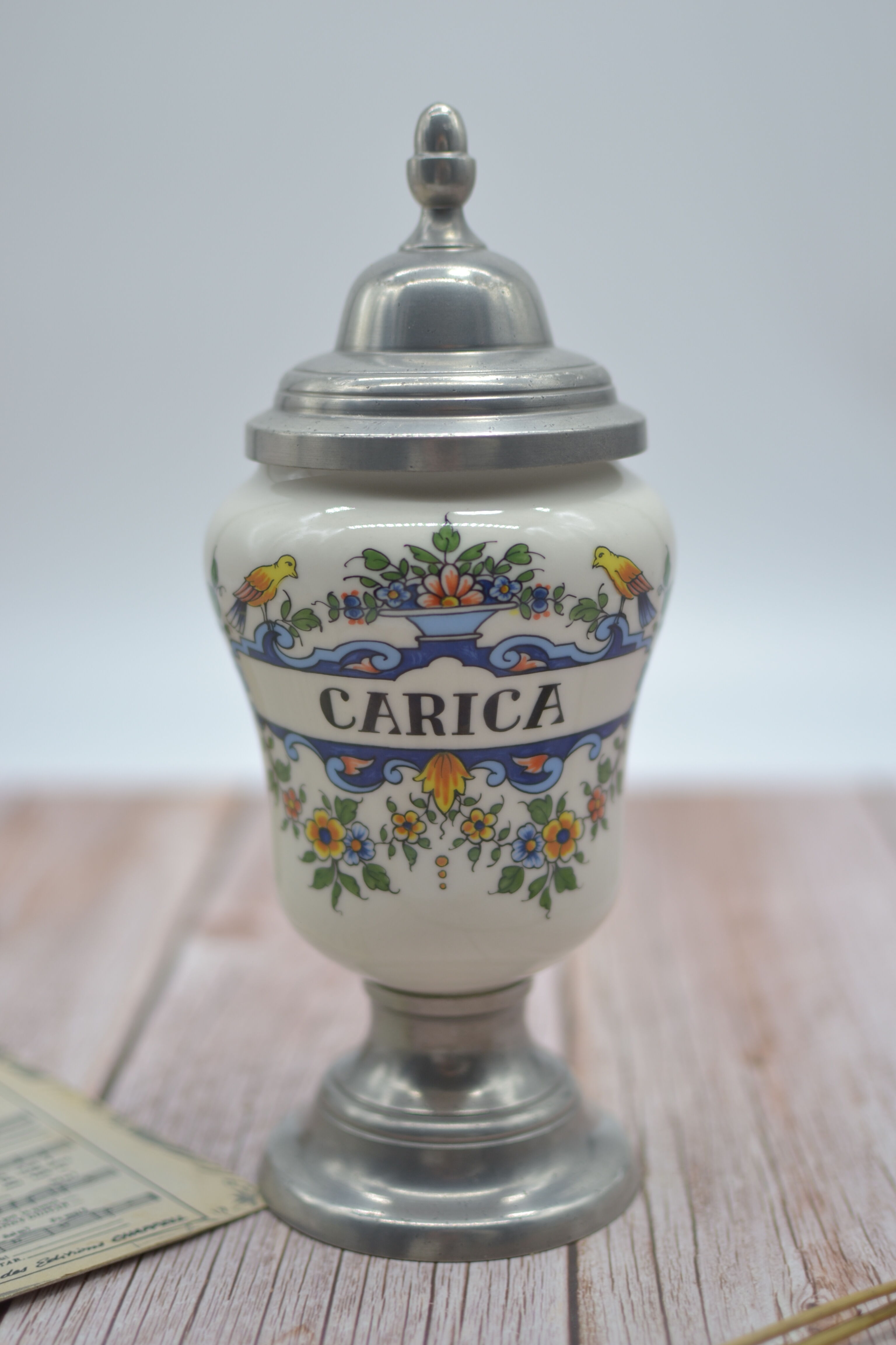 Old carica pharmacy apothecary pot with lid and tin foot