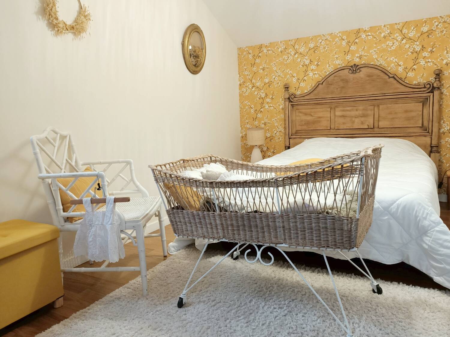 Rattan and wrought iron cradle