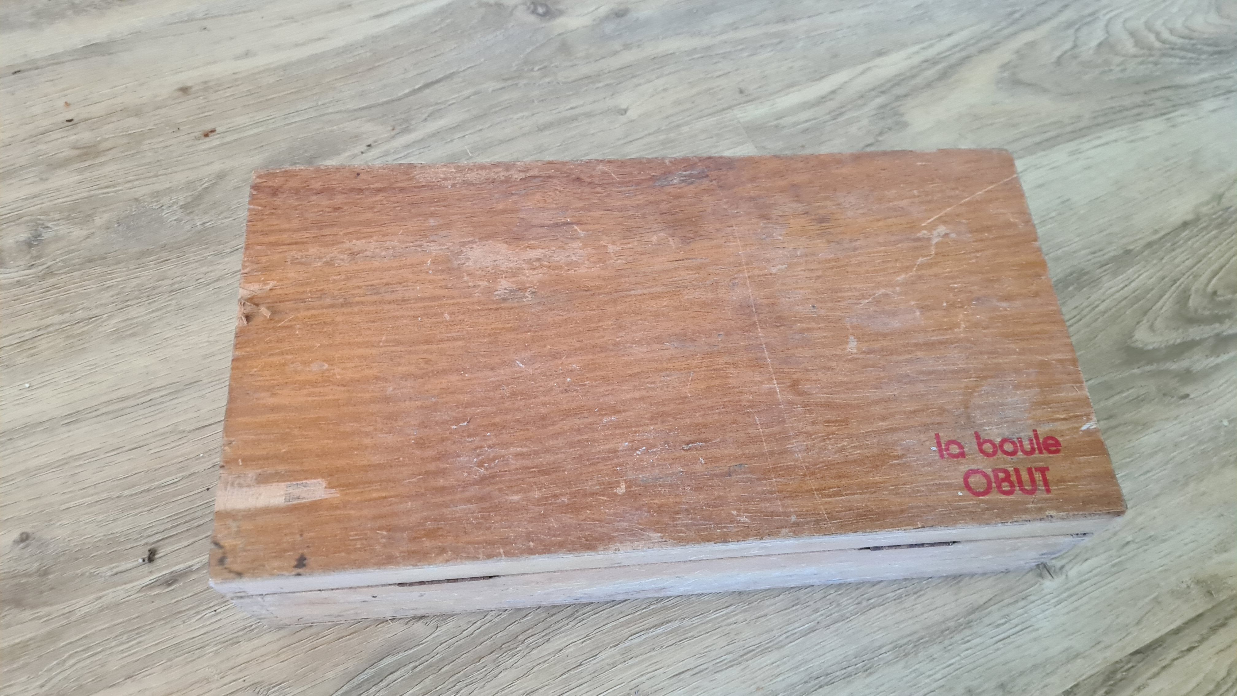 Old obut balls with original wooden box