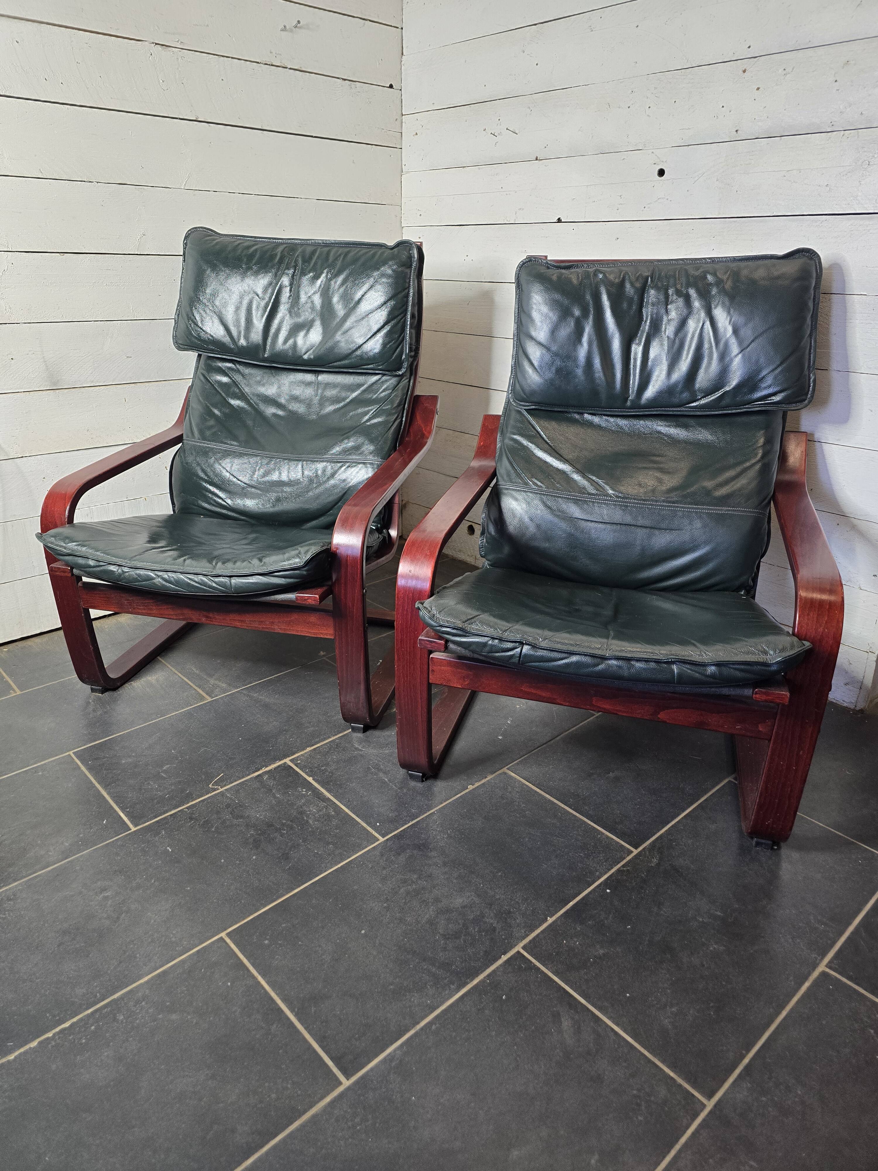 Pair of Scandinavian armchairs in leather and curved wood