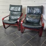 Pair of Scandinavian armchairs in leather and curved wood