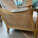 Sofa and armchair in cane and wood by Jean Roche