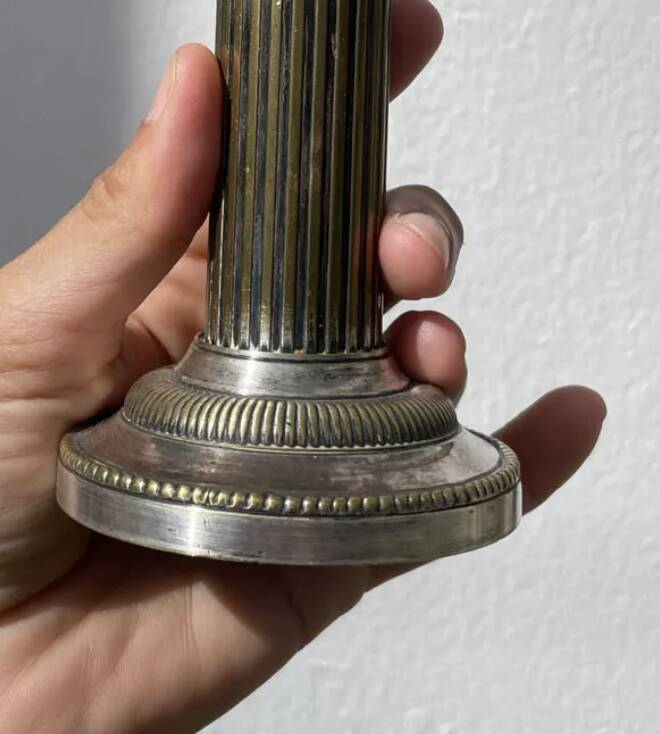 Pair of 19th-century fluted silver-plated metal candlesticks
