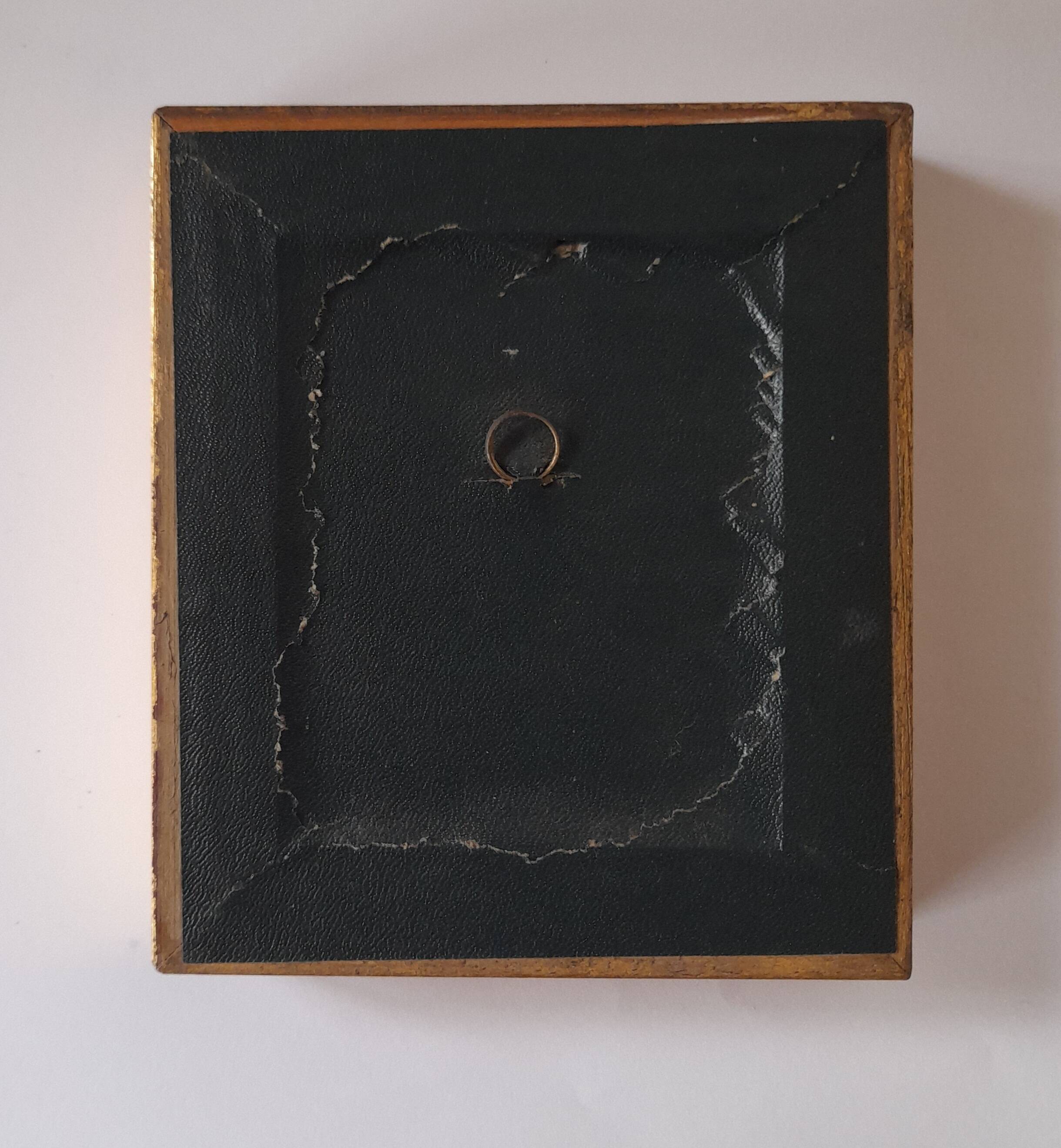 Old golden frame "lute player" on silk