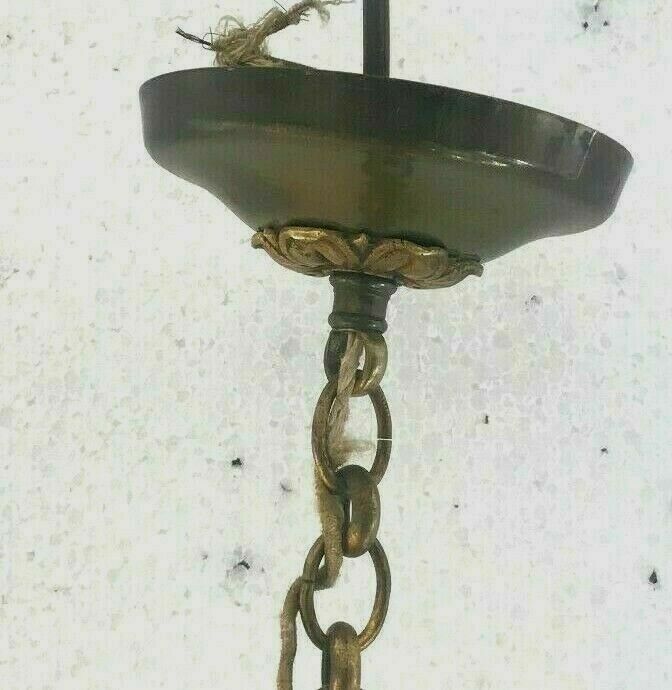 Empire-style chandelier has double patina