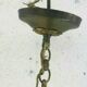 Empire-style chandelier has double patina